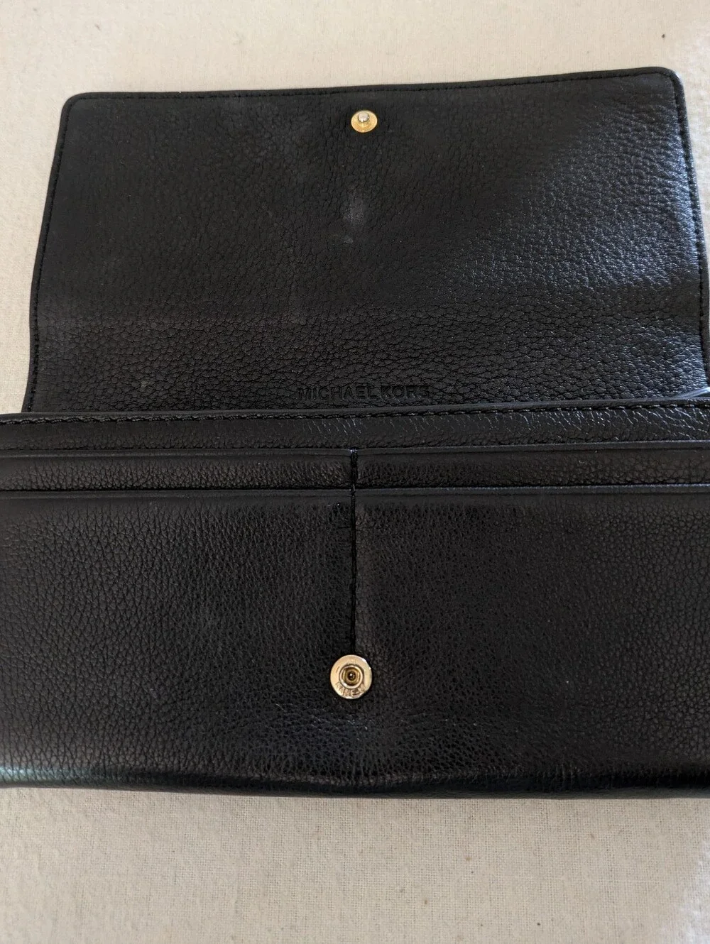 Michael Kors Black Leather Fulton Continental Wallet with Gold MK Emblem